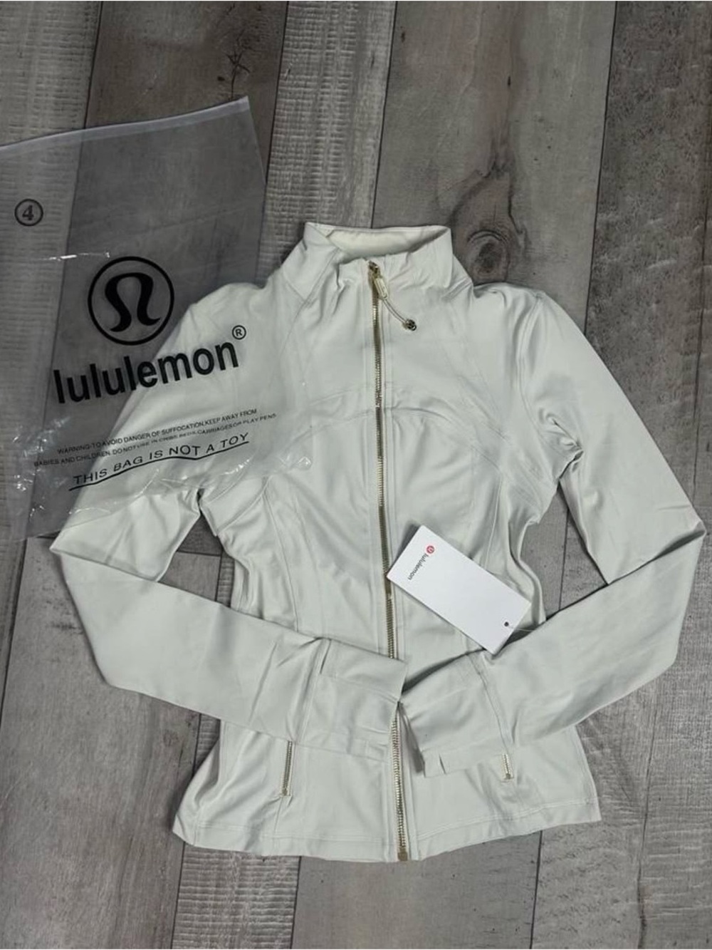 lululemon athletica Cream Zip-Up Sculpting Jacket with Gold Hardware